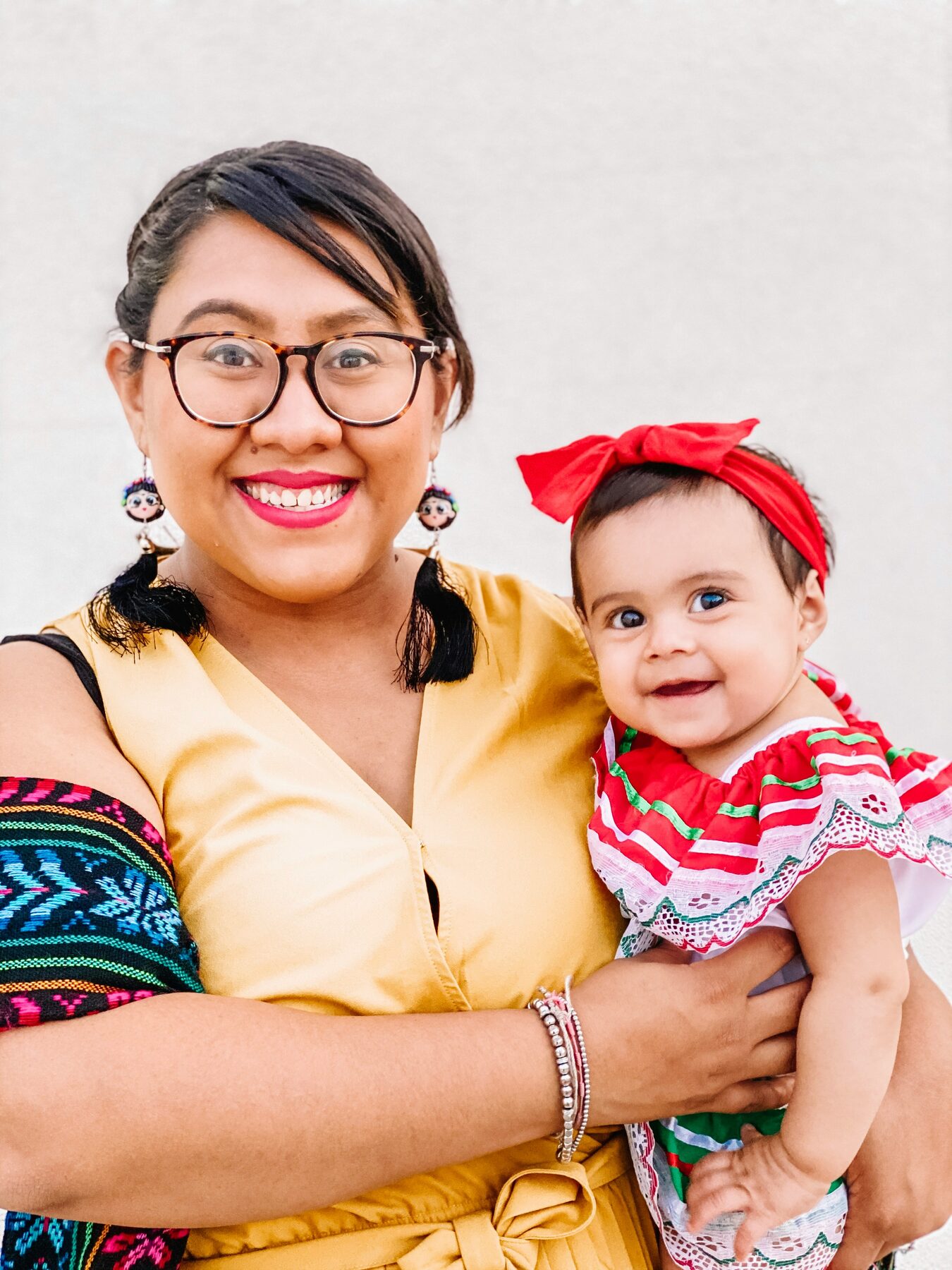 A mother and her baby in a quiet portrait at home